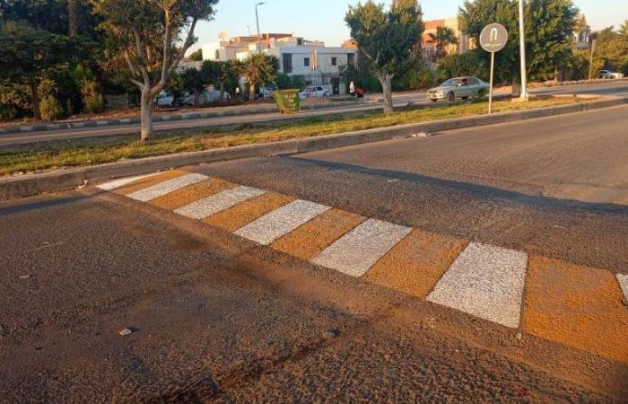 دهان المطبات بالحي الأول في العاشر من رمضان لتعزيز السلامة المرورية